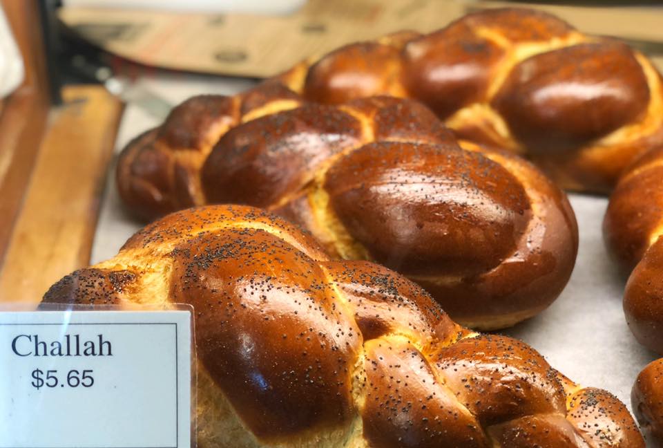 Image of a selection of challah bread loaves